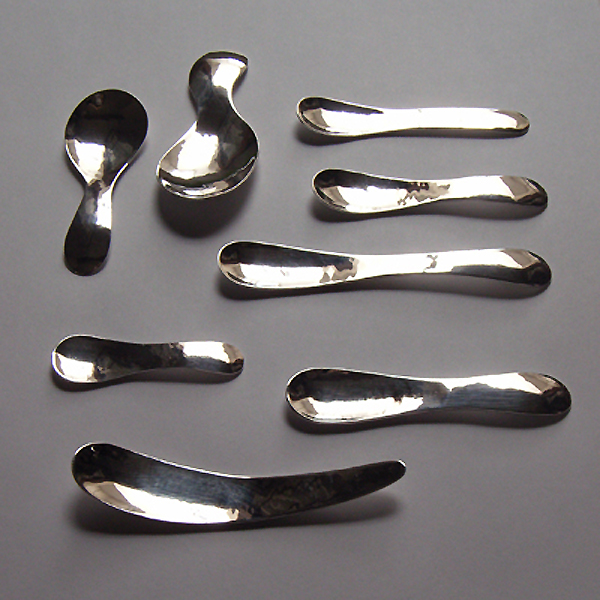 Forged silver spoons