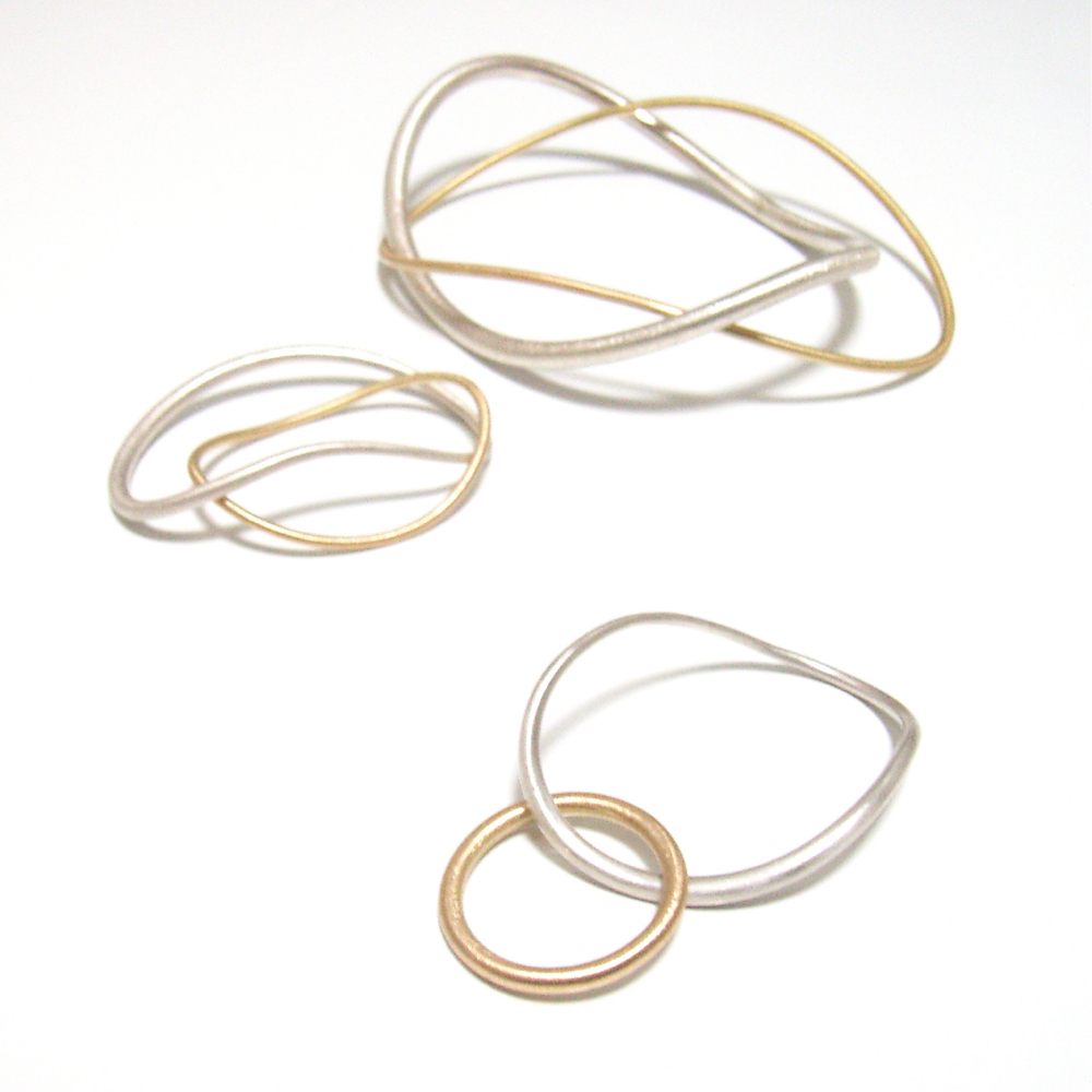 Double finger rings and bangle by Yuki Kamiya